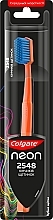Парфумерія, косметика Зубна щітка "2548 кінчиків щетинок" середньої жорсткості, помаранчева - Colgate Neon