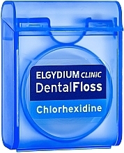 Парфумерія, косметика Зубна нитка з хлоргексидином - Elgydium Clinic Dental Floss Chlorhexidine