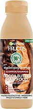 Шампунь для вьющихся и непослушных волос, разглаживающий - Garnier Fructis Cocoa Butter Hair Food Shampoo — фото N1