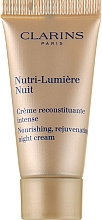 Ночной омолаживающий крем - Clarins Nutri-Lumiere Nuit Nourishing Rejuvenating Night Cream (мини) — фото N1