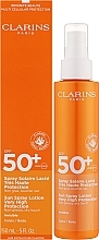 Солнцезащитный лосьон для тела - Clarins Sun Spray Lotion Very High Protection SPF 50 — фото N2