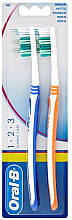 Парфумерія, косметика Набір зубних щіток "40" середньої жорсткості, блакитна+помаранчева - Oral-B 1-2-3 Classic Care Medium