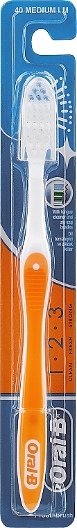 Зубна щітка, 40 середня, помаранчева з ковпачком - Oral-B 1 2 3 Classic 40 Medium — фото N1