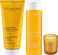 Набор - Clarins Aroma Ritual Collection (sh/conc/200ml + b/balm/200ml + candle/50g + pouch/1pc) — фото N4