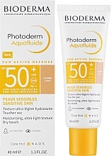 Солнцезащитный тональный флюид - Bioderma Photoderm Aquafluide SPF50+ — фото N1