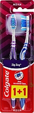 Парфумерія, косметика Зубна щітка "Зигзаг плюс" середньої жорсткості, темно-синя + фіолетова - Colgate Zig Zag Plus Medium