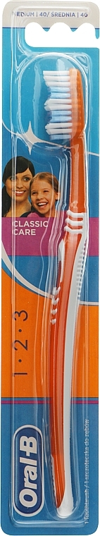 Зубная щетка, средней жесткости, оранжевая - Oral-B 1 2 3 Classic Care Medium Toothbrush — фото N1