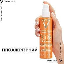 Сонцезахисний водостійкий спрей-флюїд для тіла, SPF30 - Vichy Capital Soleil Cell Protect Water Fluid Spray SPF30 — фото N9