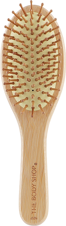 Овальна бамбукова щіточка для розчісування волосся - The Body Shop Oval Bamboo Pin Hairbrush — фото N1