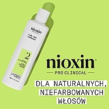 Бальзам для догляду за шкірою голови і натуральним волоссям - Nioxin Pro Clinical System 2 Scalp + Hair Thickening Conditioner — фото N2