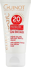 Духи, Парфюмерия, косметика Антивозрастной тонирующий крем от солнца - Guinot Uni Bronze Anti-Ageing Tinted Sun Cream SPF20