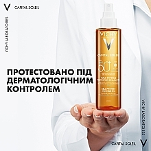 Сонцезахисна водостійка олійка для шкіри обличчя, тіла та кінчиків волосся, SPF 50+ - Vichy Capital Soleil Invisible Oil SPF 50+ — фото N7