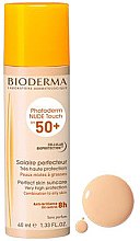 Духи, Парфюмерия, косметика Солнцезащитный тональный флюид для лица - Bioderma Photoderm Nude Touch Spf 50+ Natural Tint