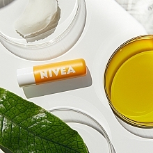 Солнцезащитный бальзам для губ - NIVEA Sun Protect Lip Balm SPF 30 — фото N2