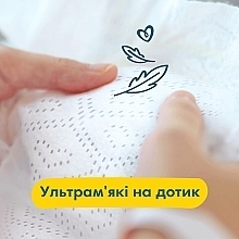 Підгузки Pampers Premium Care Newborn (4-8 кг), 68 шт. - Pampers — фото N7