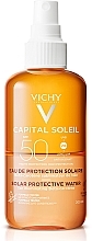 Парфумерія, косметика Сонцезахисний водний двофазний спрей для обличчя й тіла з бета-каротином, який підсилює засмагу, SPF50 - Vichy Capital Soleil Solar Protective Water