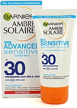 Духи, Парфюмерия, косметика Солнцезащитный крем для лица - Garnier Ambre Solaire Advanced Sensitive SPF 30