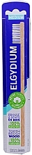 Дерев'яна зубна щітка, середня - Elgydium Wood Medium Toothbrush — фото N1