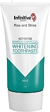 Отбеливающая зубная паста с углем - Infinitive Beauty Rise & Shine Activated Bamboo Charcoal Whitening Toothpaste — фото N1