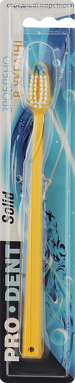 Зубна щітка ''Solid'', середньої жорсткості, жовта - Pro Dent
