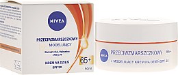 Дневной крем "Против морщин + моделирование" - NIVEA Anti-Wrinkle Day Cream 65+ — фото N1