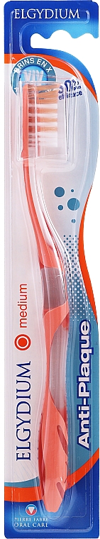Зубна щіта "Антиналіт", середня, помаранчева - Elgydium Anti-Plaque Medium Toothbrush — фото N1