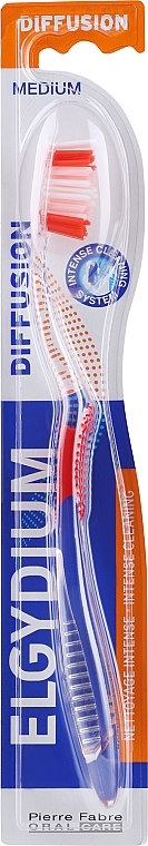 Зубная щетка "Diffusion" средняя, оранжевая - Elgydium Diffusion Medium Toothbrush — фото N1