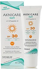 Духи, Парфюмерия, косметика Защитный крем для лица SPF 30 - Synchroline Aknicare Sun Teintee