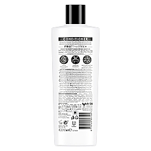 Кондиционер для волос восстанавливающий - Tresemme Biotin Repair & Protect Conditioner — фото N2