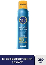 Солнцезащитный освежающий мист "Защита и сухое прикосновение" - NIVEA Sun Spray SPF 50 — фото N2