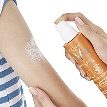 Солнцезащитный водостойкий спрей-флюид для чувствительной кожи детей, SPF50+ - Vichy Capital Soleil Kids Cell Protect Water Fluid Spray — фото N4