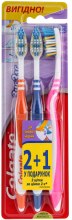 Духи, Парфюмерия, косметика Набор "ЗигЗаг", средней жесткости, оранжевая + синяя + розовая - Colgate Medium Toothbrush
