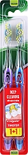 Духи, Парфюмерия, косметика Зубная щетка "Twister", средняя, голубая + фиолетовая - Colgate Twister Medium