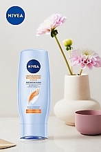 Мягкий бальзам "Направленное восстановление и забота" для ослабленных волос - NIVEA — фото N2