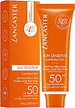 Парфумерія, косметика Сонцезахисний флюїд для обличчя без олії SPF50 - Lancaster Sun Sensitive Oil Free Milky Fluid SPF50