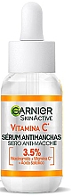 Освітлювальна сироватка проти темних плям - Garnier Vitamin C Anti-Dark Spots & Brightening Serum — фото N1