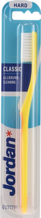 Зубная щетка с жесткой щетиной "Классик", желтая с оранжевым - Jordan Classic Hard Toothbrush — фото N1