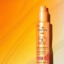 Сонцезахисний спрей для тіла та обличчя - Nuxe Sun High Protection Mild Spray SPF 50 — фото N5