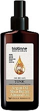 Тонік-спрей з оліями арганії, мигдалю та маслом ши - Biotinne Smoothing & Lengthening Tonic — фото N1