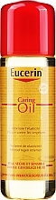 Натуральне масло від розтяжок - Eucerin Caring Oil — фото N1