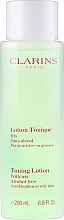 Духи, Парфюмерия, косметика Тонизирующий лосьон - Clarins Toning Lotion With Iris