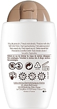 Солнцезащитный минеральный флюид с тонирующим эффектом - Avene Eau Thermale Tinted Mineral Fluid SPF 50+ — фото N2