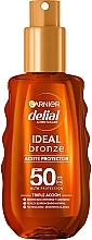 Духи, Парфюмерия, косметика Спрей-бронзатор - Garnier Delial Ideal Bronze Spray Invisile SPF50