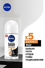 Дезодорант кульковий антиперспірант "Невидимий для чорного і білого" - NIVEA Black & White Extra Deodorant Roll-on — фото N3
