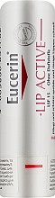 Бальзам для сухої шкіри губ - Eucerin pH5 Lip Activ SPF15 — фото N1