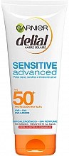 Солнцезащитное молочко для тела - Garnier Delial Ambre Solaire Sensitive Advanced SPF50+ — фото N1