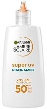 Духи, Парфюмерия, косметика Солнцезащитный флюид - Garnier Ambre Solaire Super UV Niacinamidem SPF50