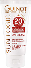 Антивіковий бронзувальний сонцезахисний крем для обличчя - Guinot Sun Logic Uni Bronze Anti-Ageing Tinted SPF20 — фото N1