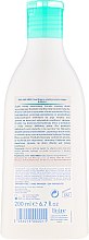 М'який засіб для купання дітей з перших днів життя - Biolane Baby Essential Cleansing Emulsion — фото N2