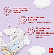 Підгузки на липучках Ultra Comfort M-Pack 4 (7-18 кг), 132 шт. - Huggies — фото N5